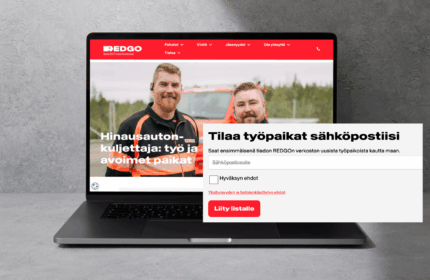 Kuvassa REDGOn verkkosivu, jossa kaksi hinausalan työntekijää poseeraa hinausauton edessä. Näytöllä näkyy sivun otsikko "Hinausautonkuljettaja: työ ja avoimet paikat". Etualalla erillinen näkymä lomakkeesta, jossa kehotetaan tilaamaan avoimet työpaikat sähköpostiin REDGOn verkostosta.
